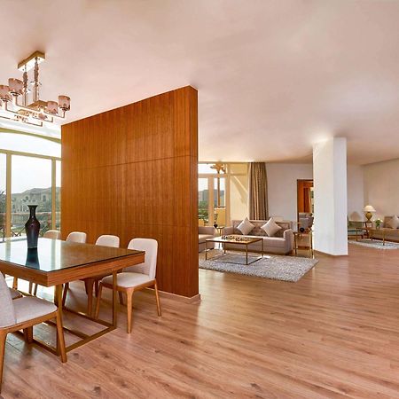 Moevenpick Hotel Cairo - Media City Giza Exterior foto A 3D rendering of a living room
